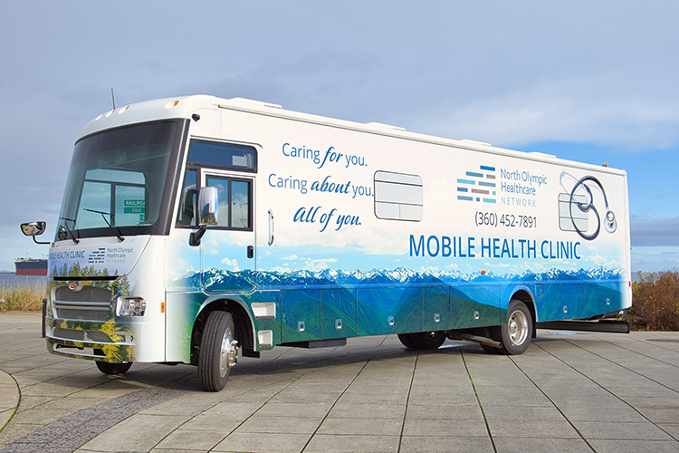 Mobile Health Clinic parked along waterfront.